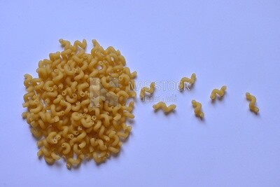 Uncooked Cellentani pasta ,One of the types of pasta