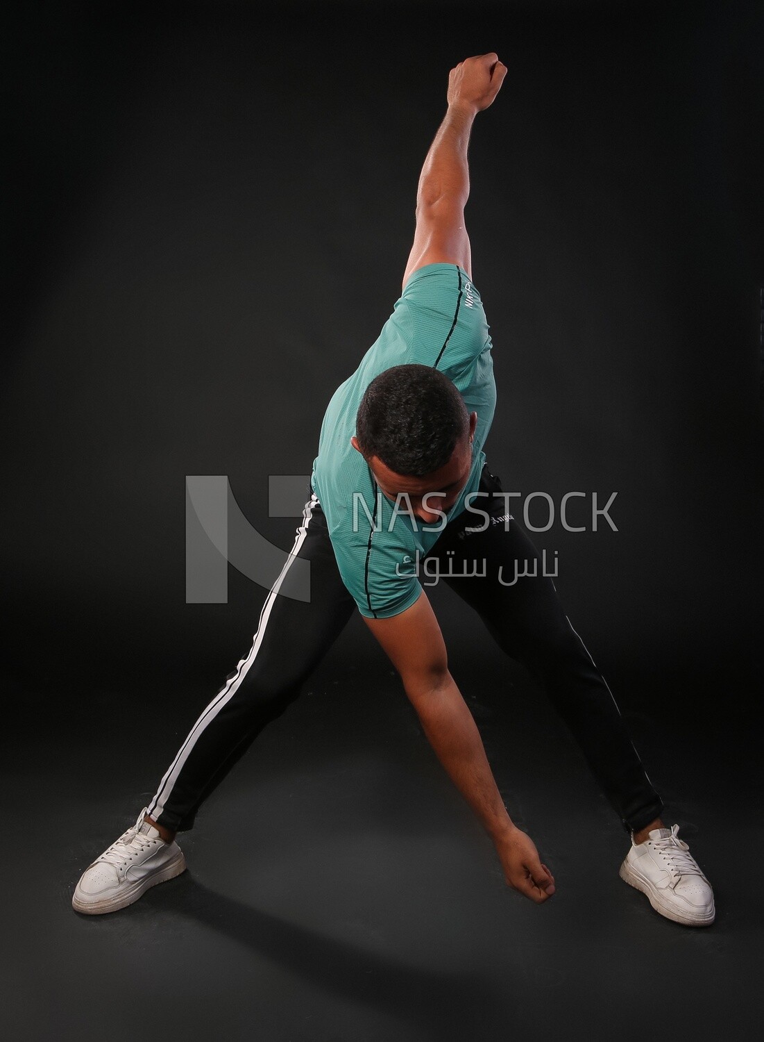A man training on a black background