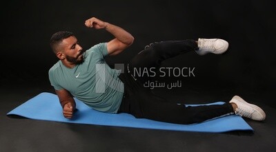 A man training on a black background