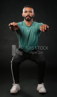 A man training on a black background