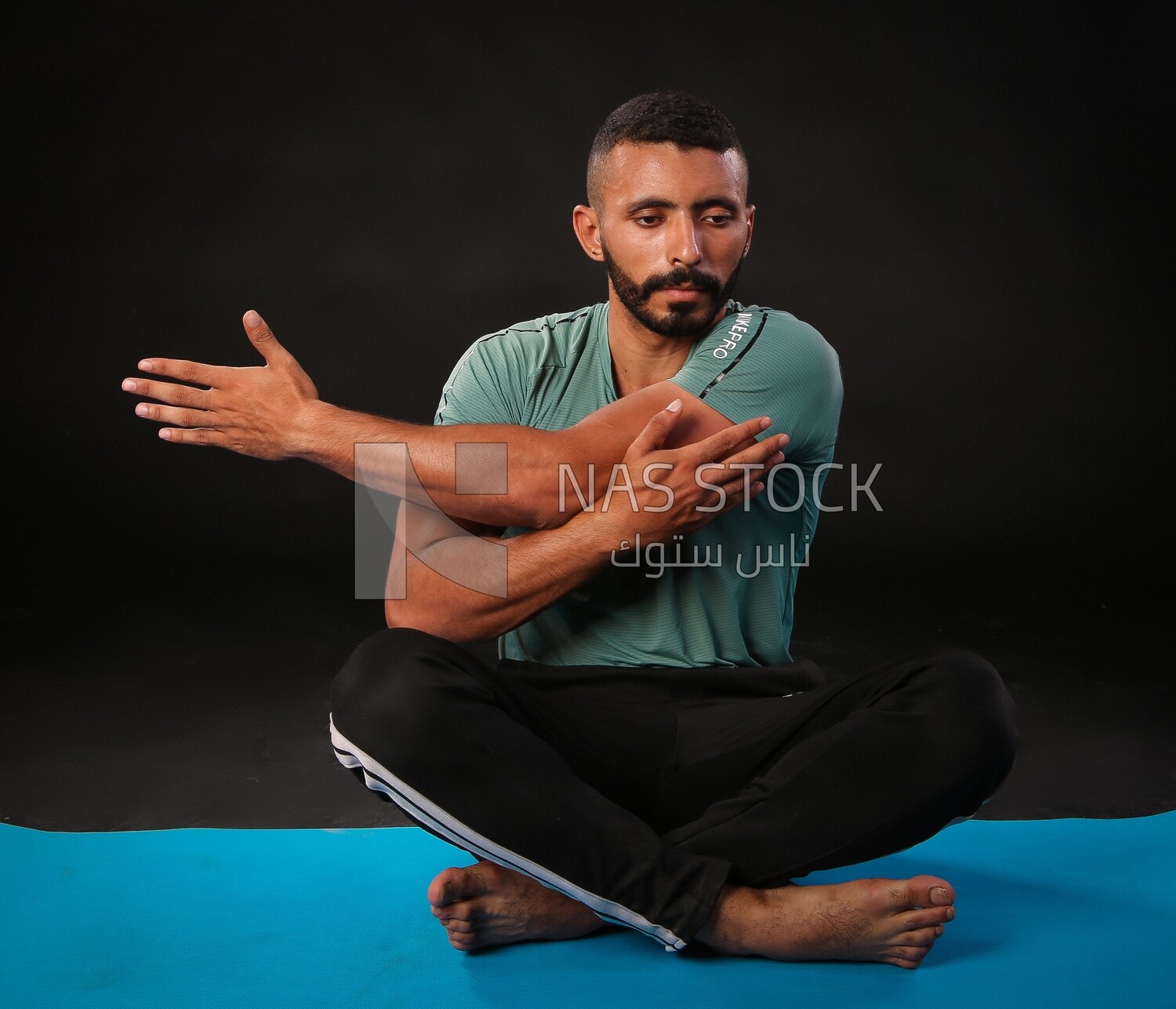 A man training on a black background