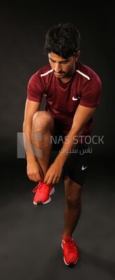A man training on a black background