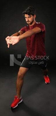 A man training on a black background
