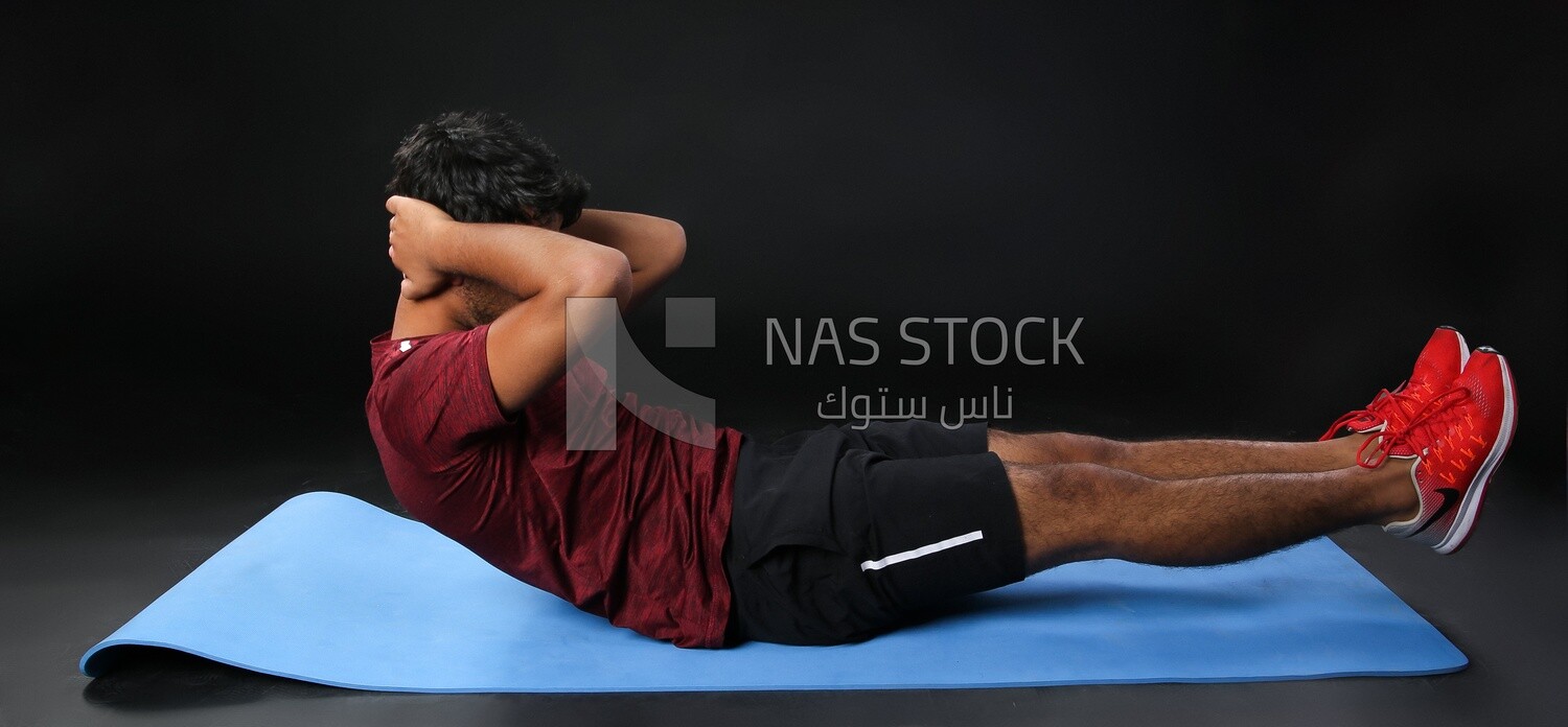 A man training on a black background