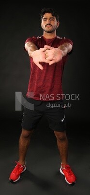 A man training on a black background