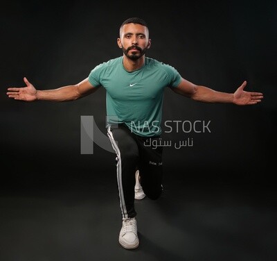 A man training on a black background