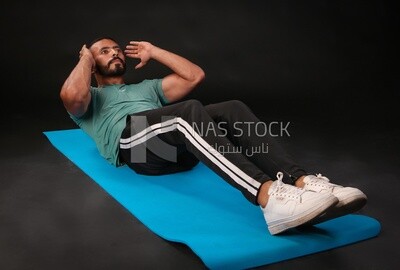 A man training on a black background