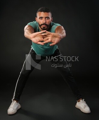 A man training on a black background
