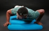 A man training on a black background