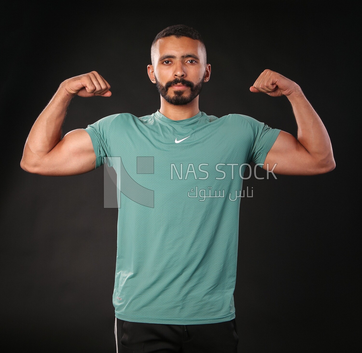 A man training on a black background