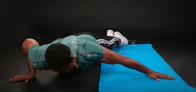 A man training on a black background