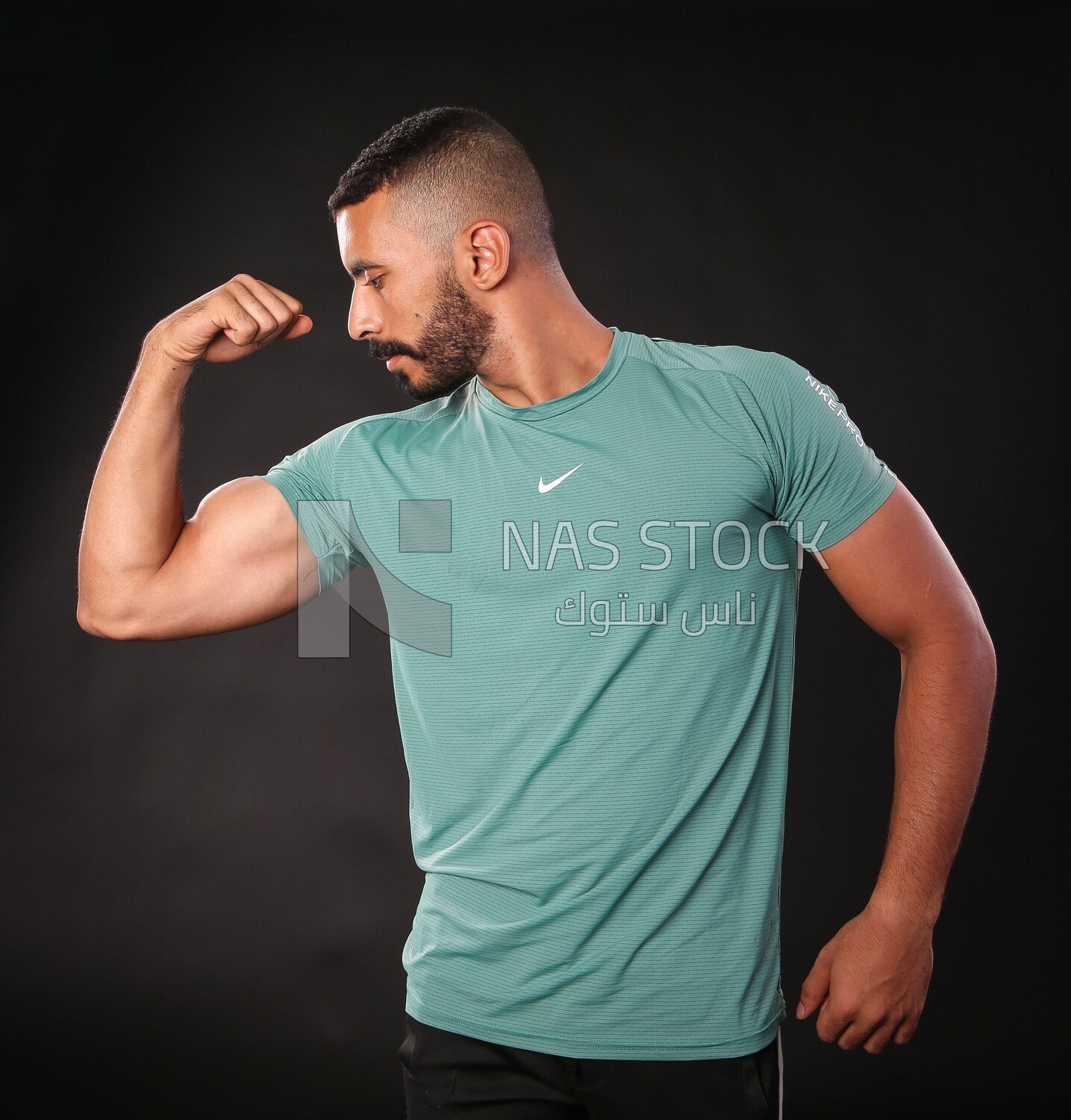 A man training on a black background
