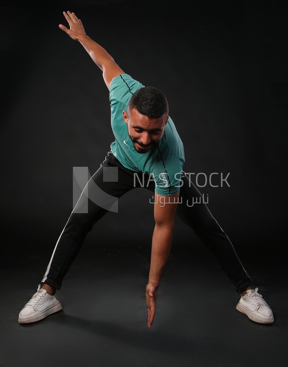 A man training on a black background