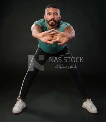 A man training on a black background