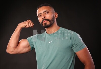 A man training on a black background