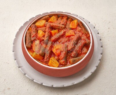Rice kofta with potatoes on a solid background