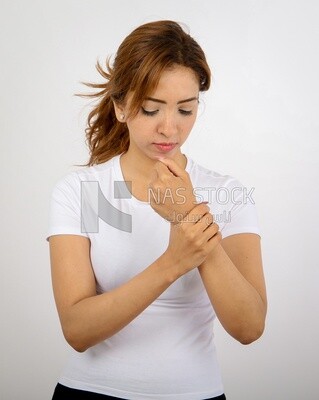 A woman wearing sportswear on a white background