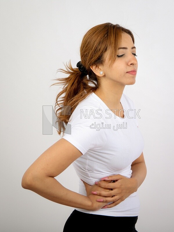 A woman wearing sportswear on a white background