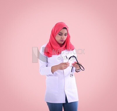 A woman doctor wearing a hijab