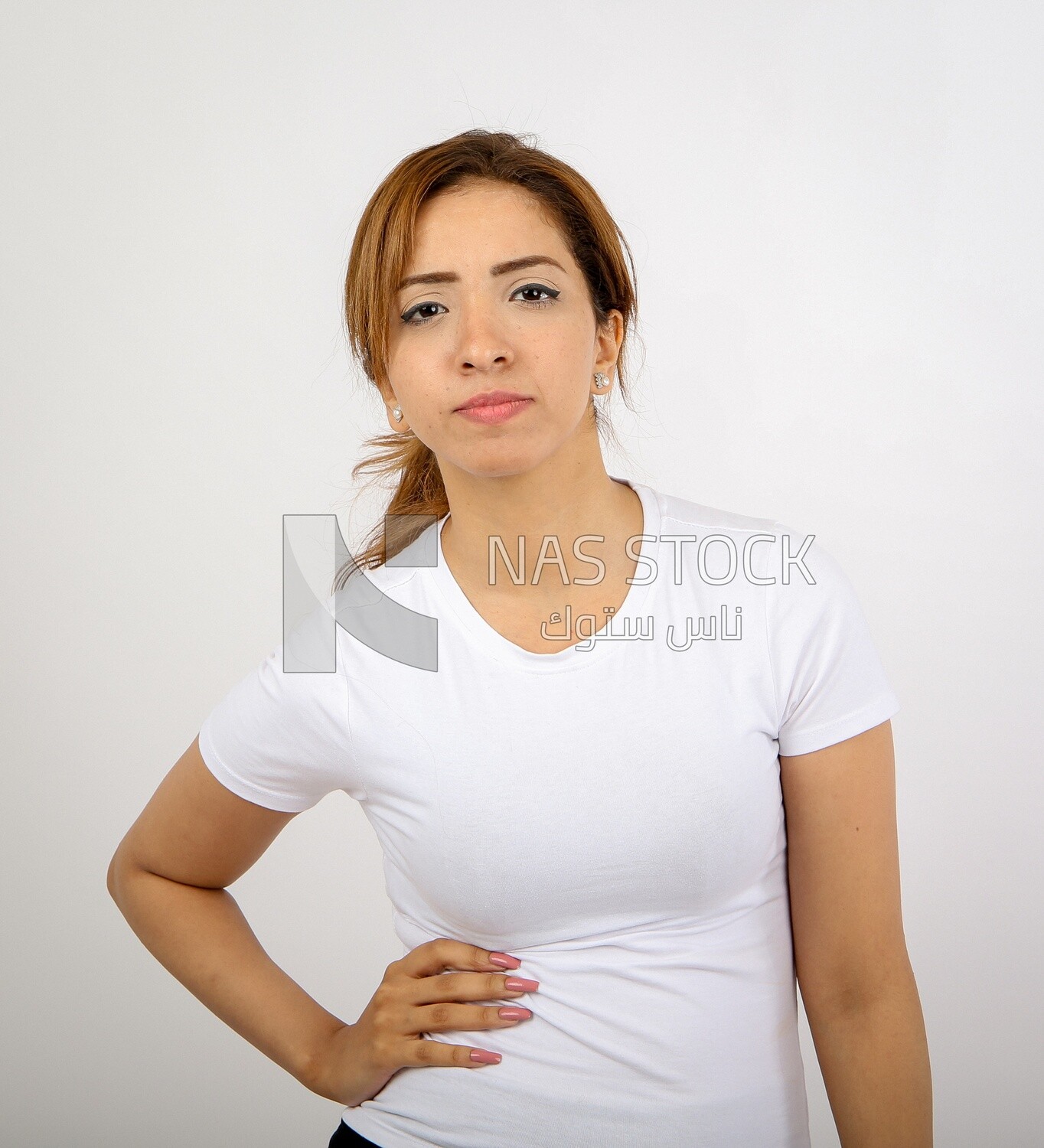 A woman wearing sportswear on a white background