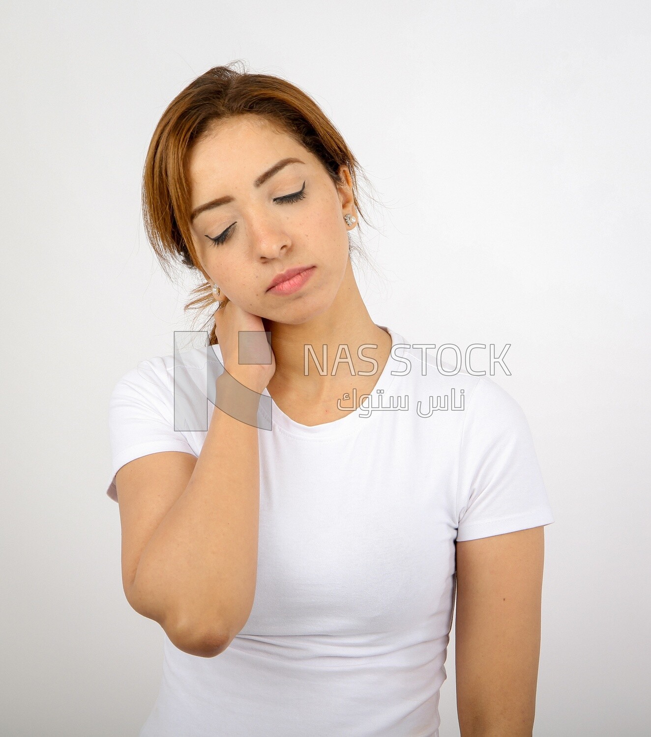 A woman wearing sportswear on a white background