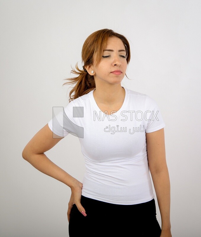 A woman wearing sportswear on a white background