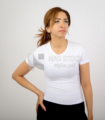 A woman wearing sportswear on a white background