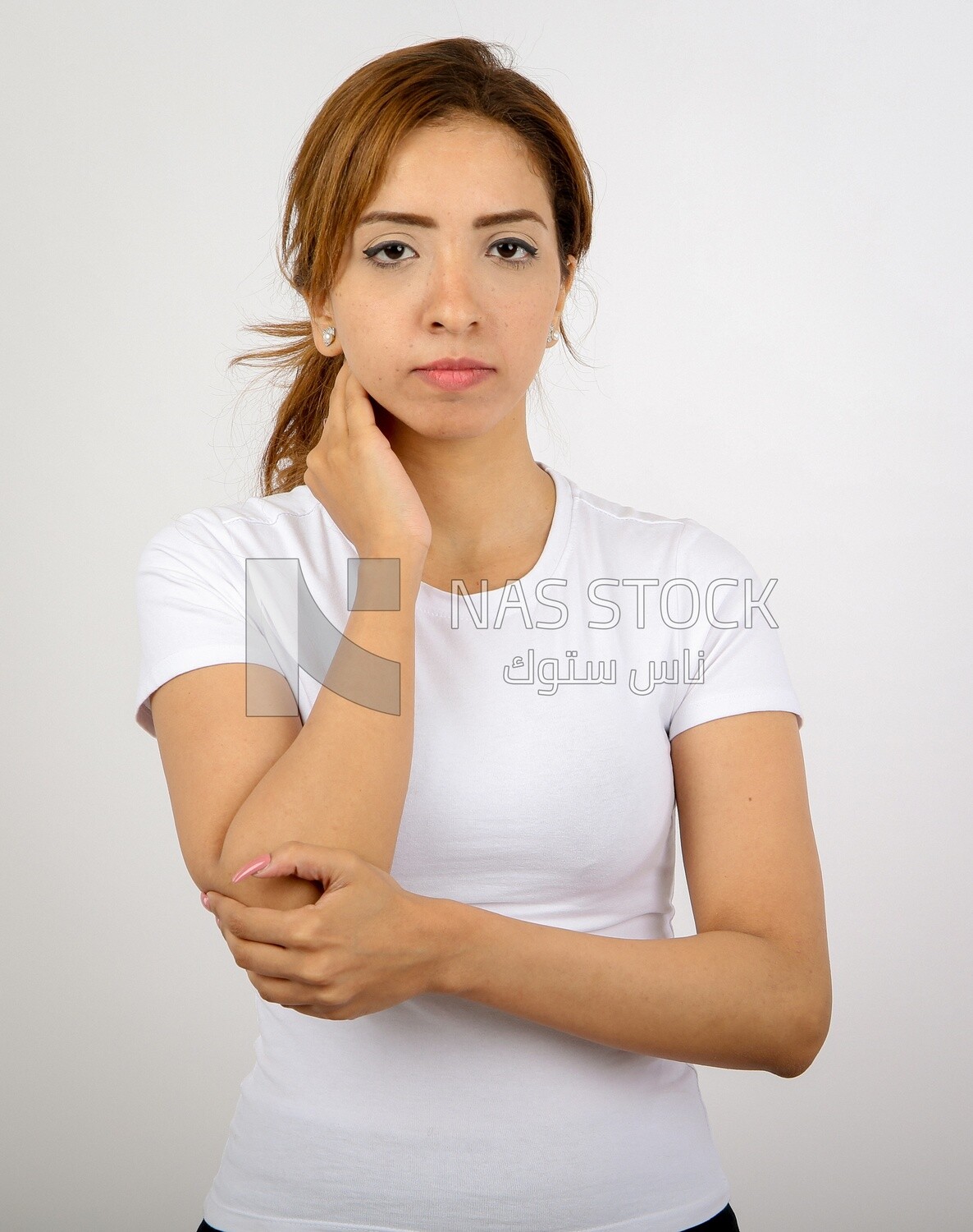 A woman wearing sportswear on a white background