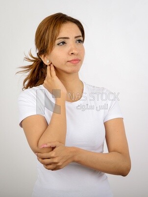 A woman wearing sportswear on a white background