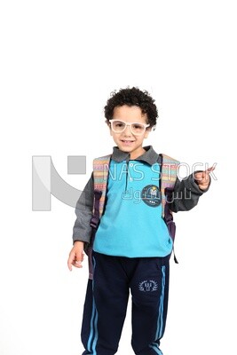 A boy wearing his bag on a white background