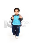 A boy wearing his bag on a white background