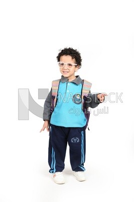 A boy wearing his bag on a white background