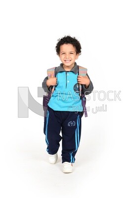 A boy wearing his bag on a white background