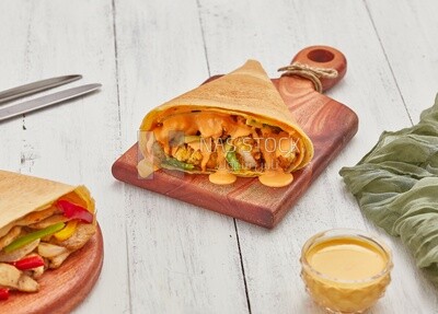 Chicken strips crepe on a dining table
