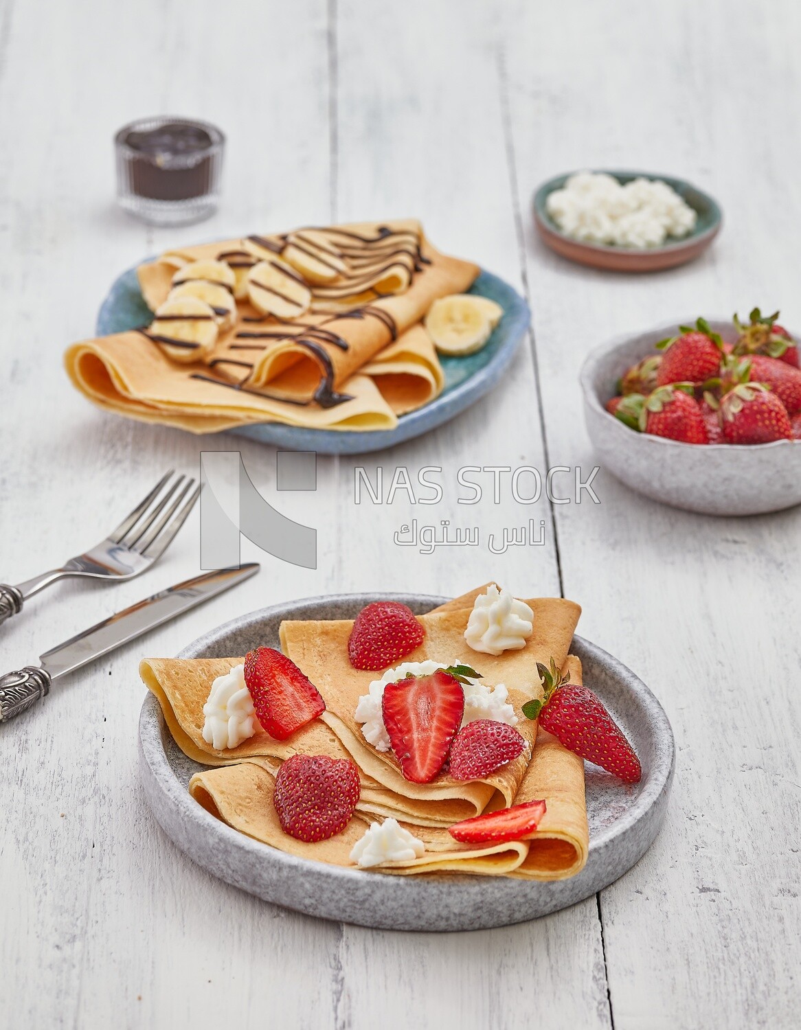 Strawberry crepe covered with chocolate and cream