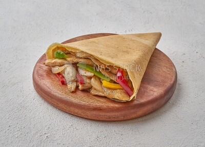 Grilled chicken crepe on a solid background