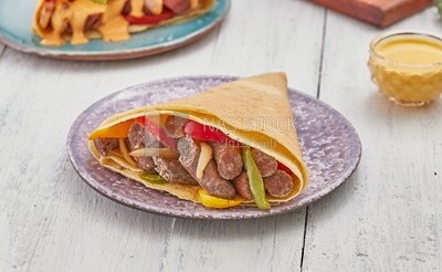 Sausage crepe with peppers and vegetables