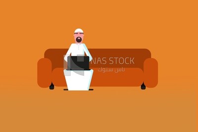 Gulf man sitting on the sofa working on the laptop