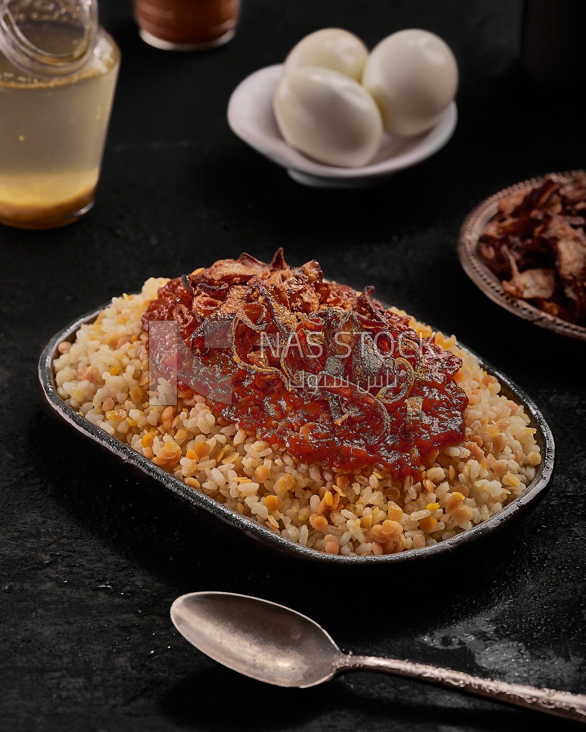 Alexandrian Koshari dish with appetizers
