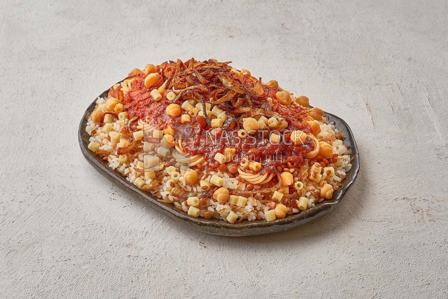 Egyptian Koshary with red sauce
