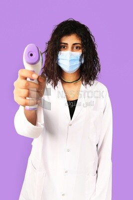 A woman wearing a mask
