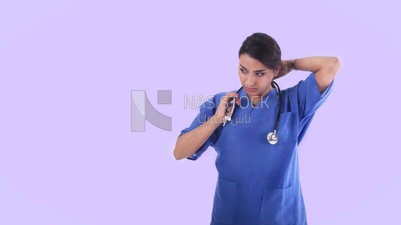 A woman doctor holding a stethoscope