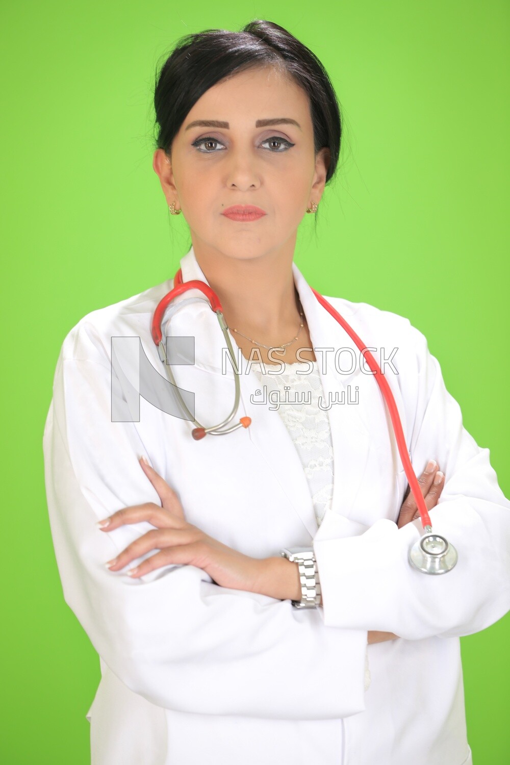 A woman doctor holding a stethoscope