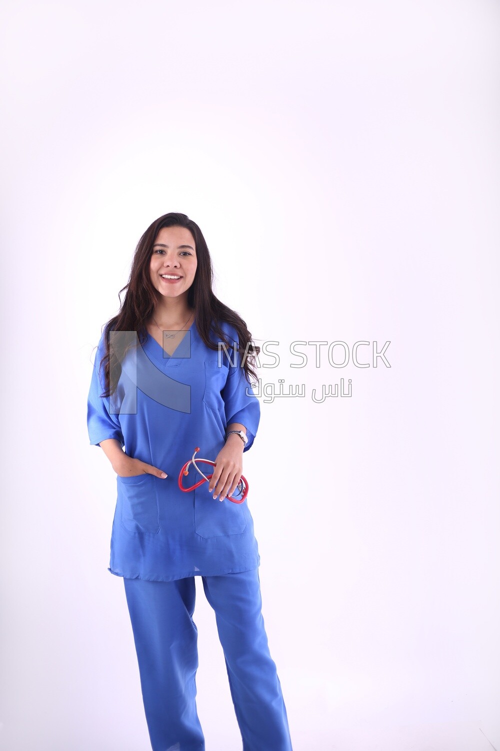 A woman doctor holding a stethoscope