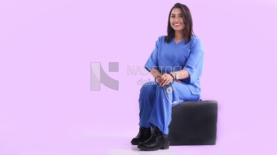 A woman doctor holding a stethoscope