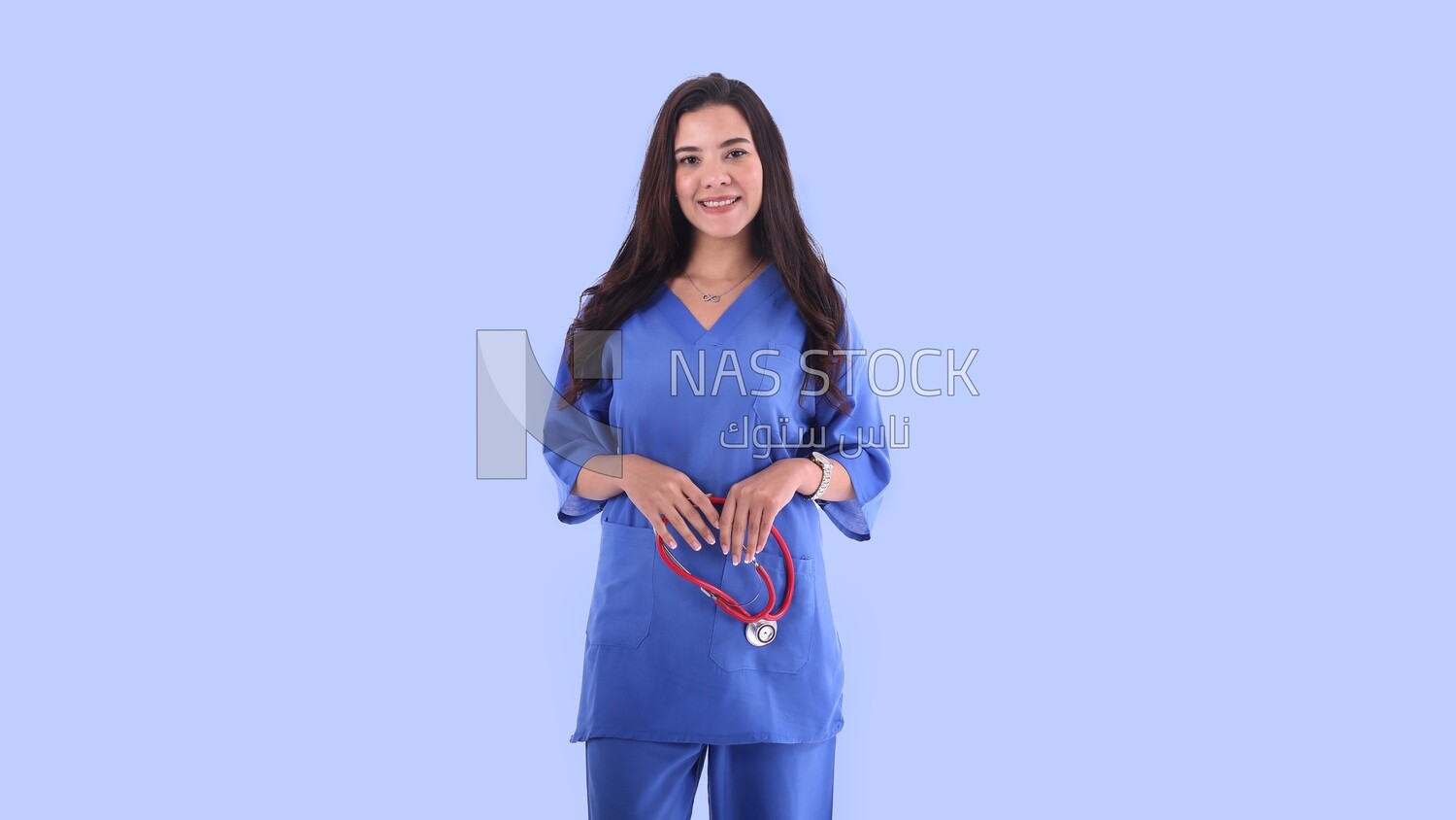 A woman doctor holding a stethoscope