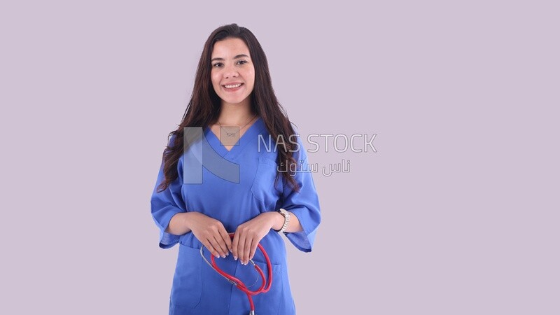 A woman doctor holding a stethoscope