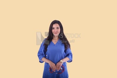 A woman doctor holding a stethoscope