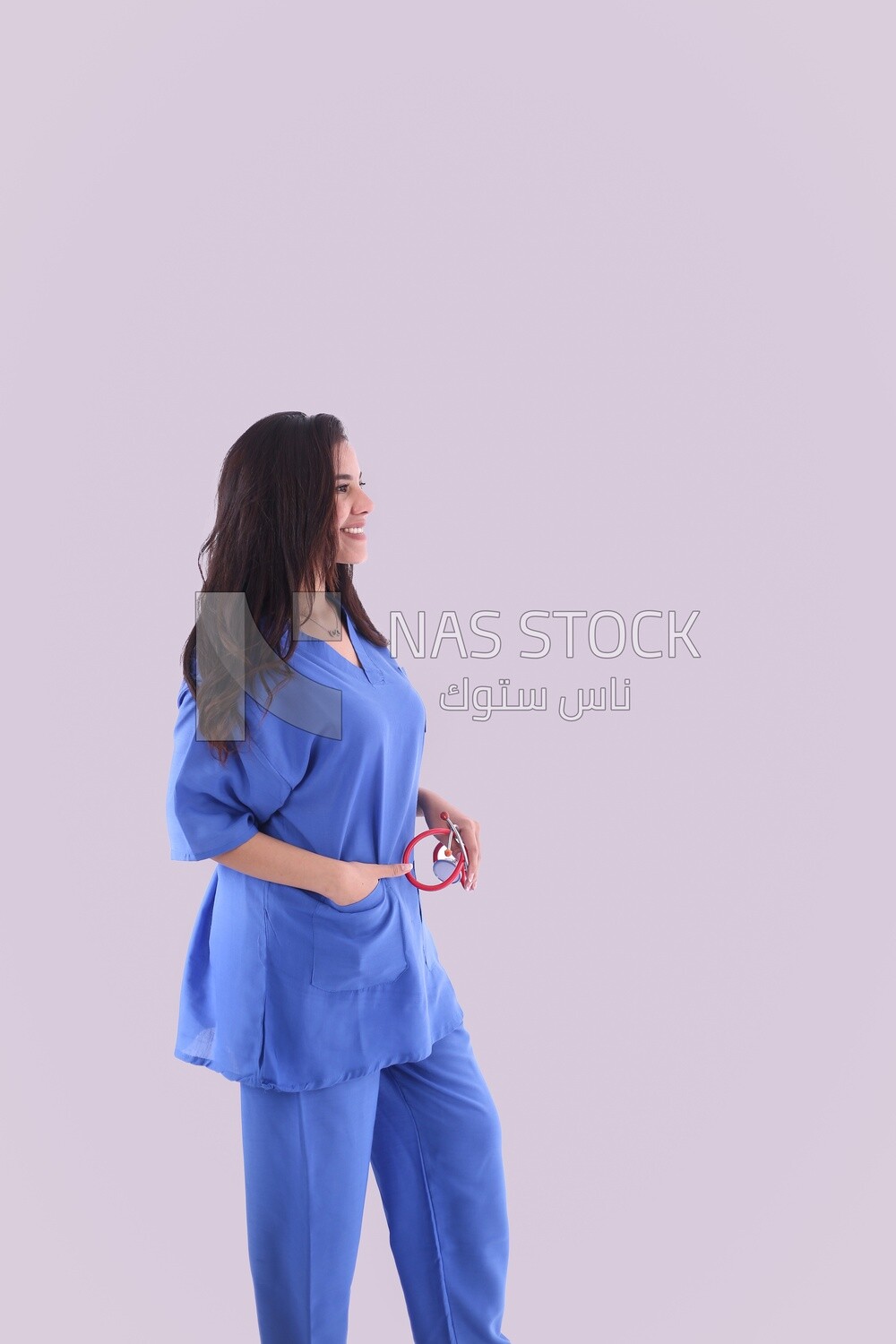 A woman doctor holding a stethoscope