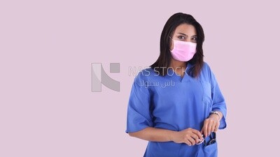 A woman doctor wearing a mask